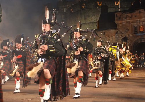 Bagpipers marching and playing in the Edinburgh Military Tattoo. 