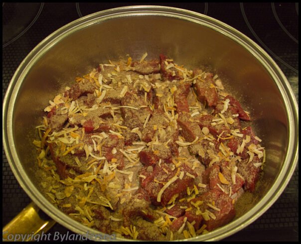 Meat with dry onion soup mix. Sprinkle dry onion soup mix over meat.