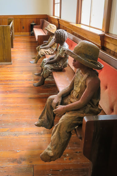 Terracotta statues of the children of slaves at Whitney Plantation. 