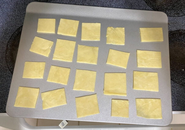 Cut dough squares ready for filling. 